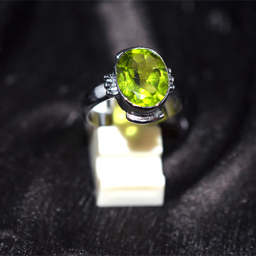 925 Sterling Silver Oval Faceted Peridot Ring with Ornate Setting