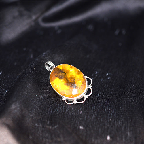 925 Sterling Silver Oval Faceted Amber Pendant with Scroll Setting