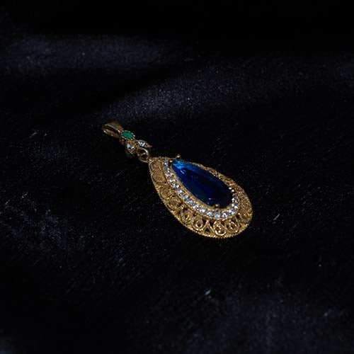 6 Carat Gold Plated Royal Blue Teardrop Pendant with Crystal Halo