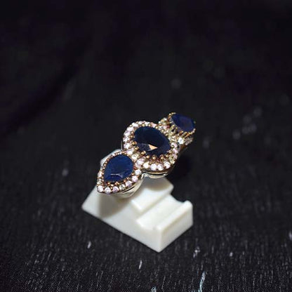 6 Carat Gold Plated Blue and White Three Stone Ring
