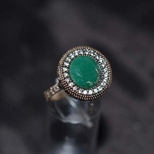 6 Carat Gold Plated Green and White Oval Halo Ring
