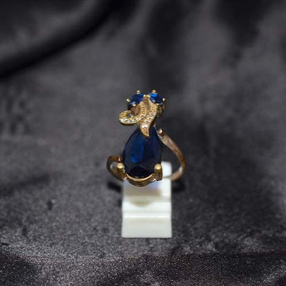 6 Carat Gold Plated Blue Sapphire Artistic Teardrop Ring