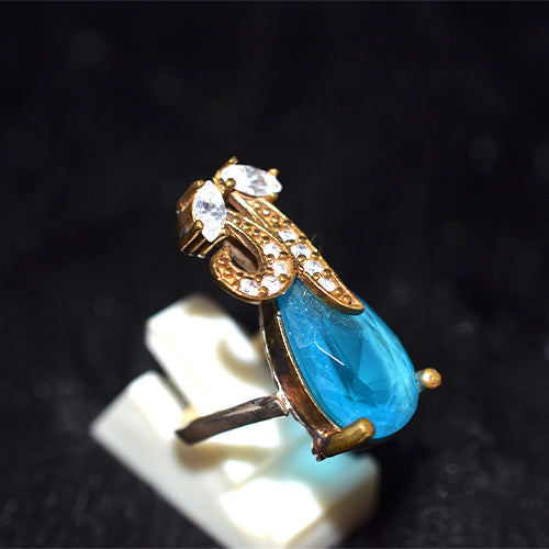 6 Carat Gold Plated Turkish Pear Cut Blue Topaz Scroll Accent Ring